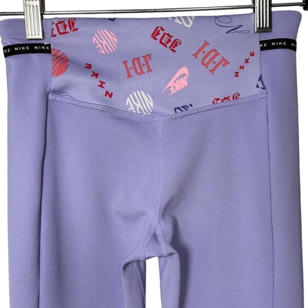 Nike Girls Dri-FIT High Rise Graphic Waist Split Hem Leggings Purple Medium M